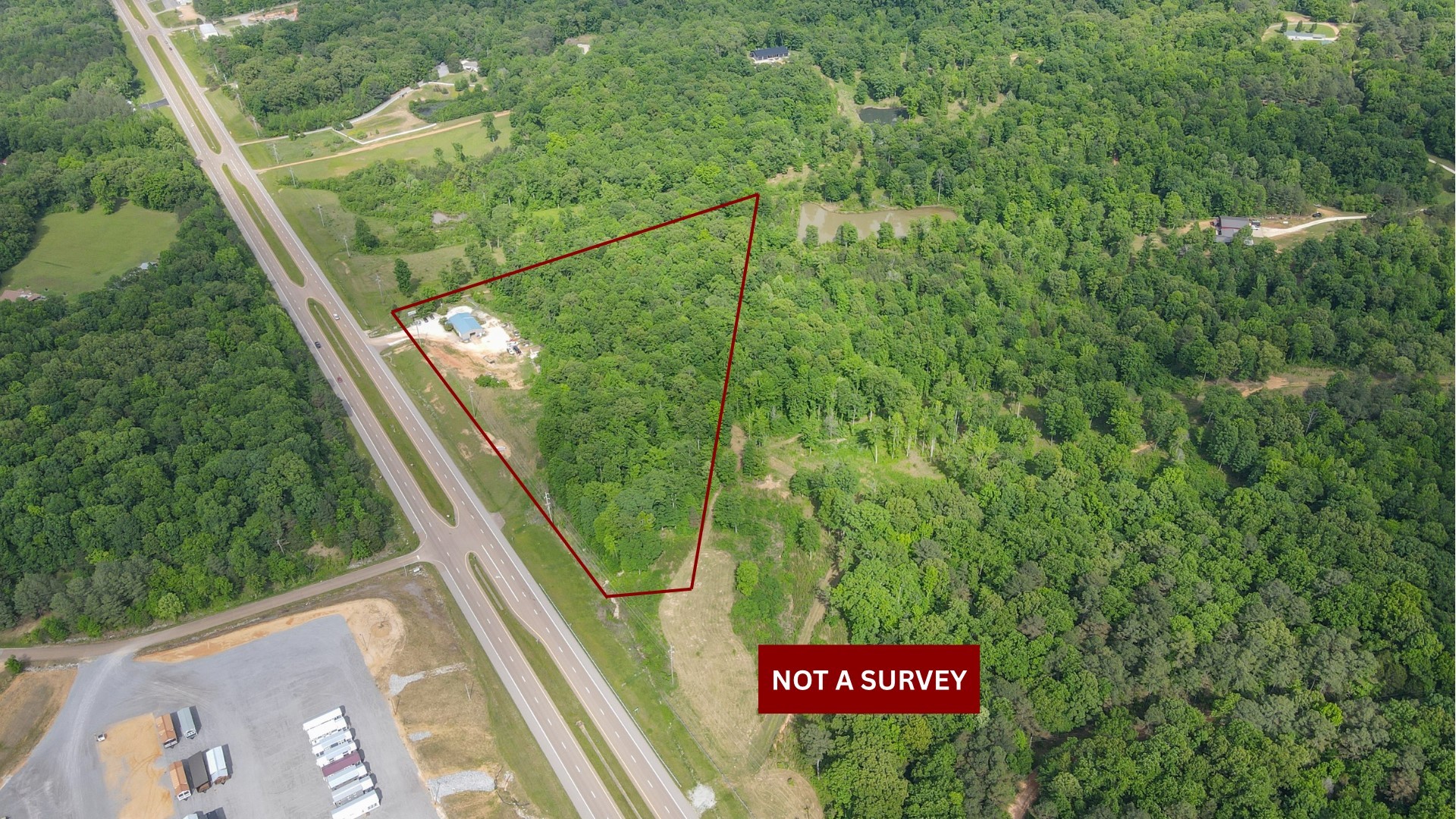 10610 Highway 79 Springville, TN 38256 - Photo 59 of 60 a sign that is on the side of a building