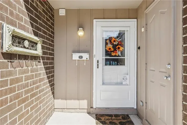 a view of bathroom with a shower and a sink