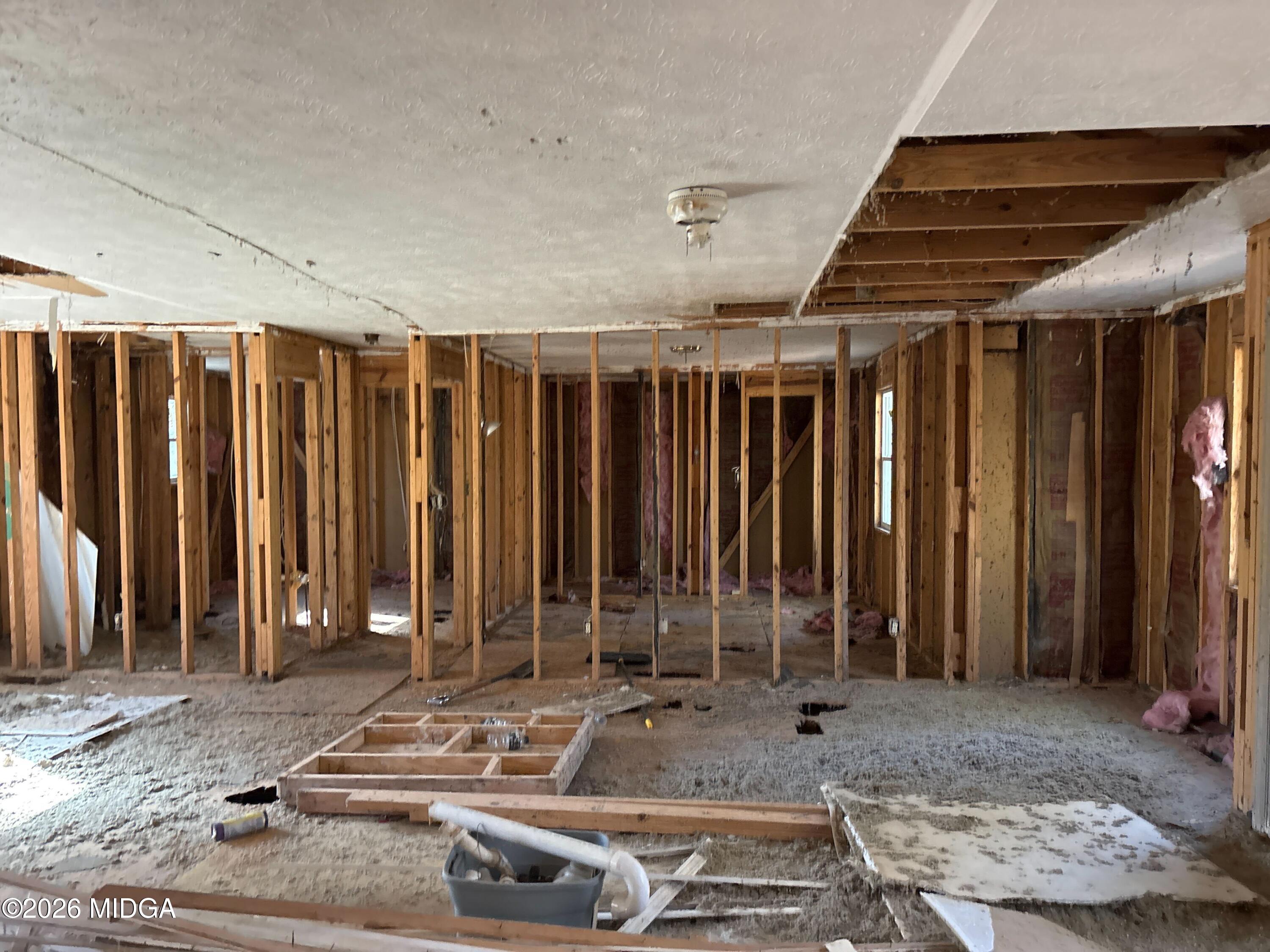 283 Springview Drive Macon, GA 31220 - Photo 2 of 4 a view of a room with door and chair