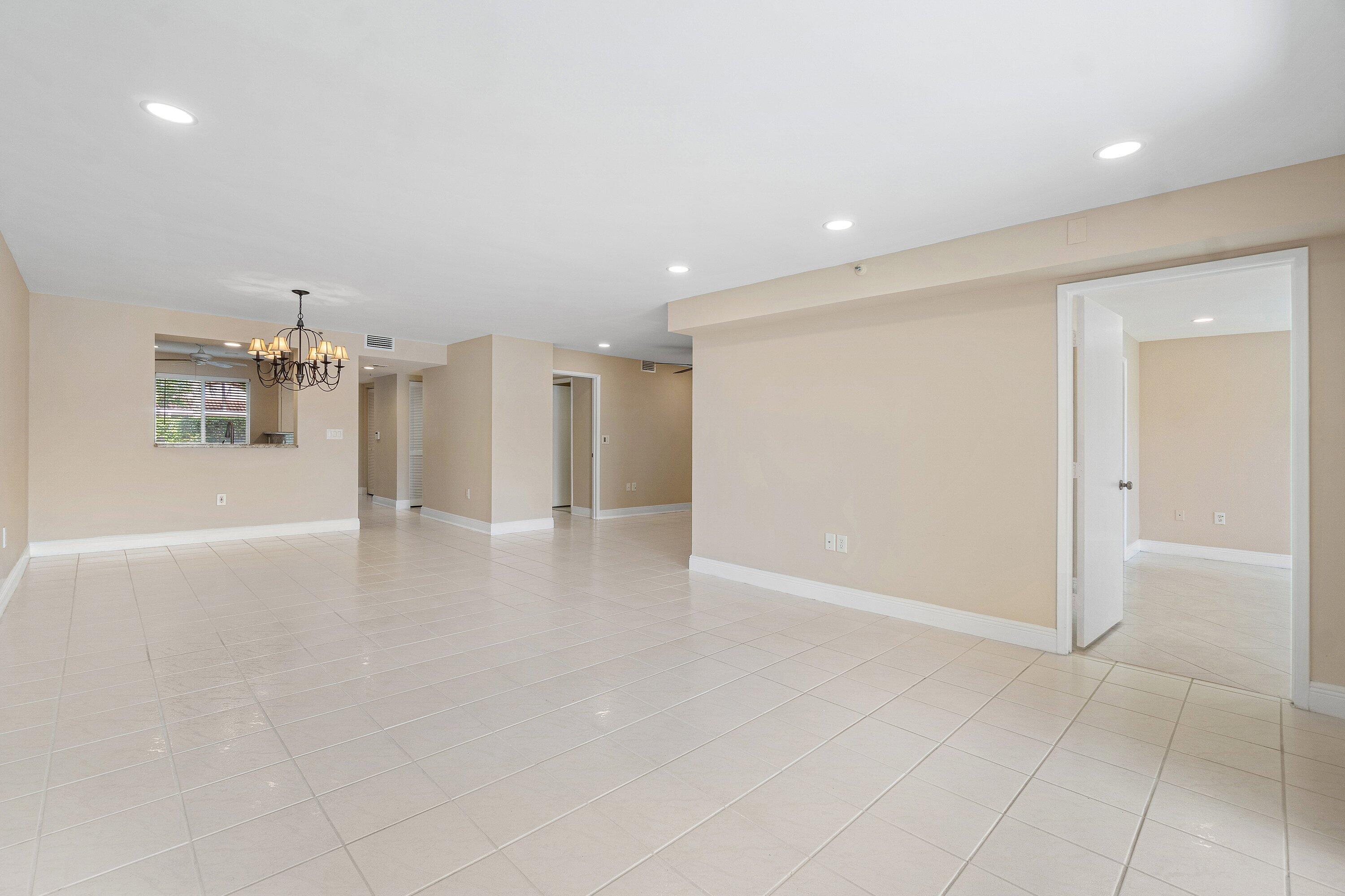 14096 Huntington Pointe Drive, Unit 106 Delray Beach, FL 33484 - Photo 15 of 47 a view of a livingroom with a furniture