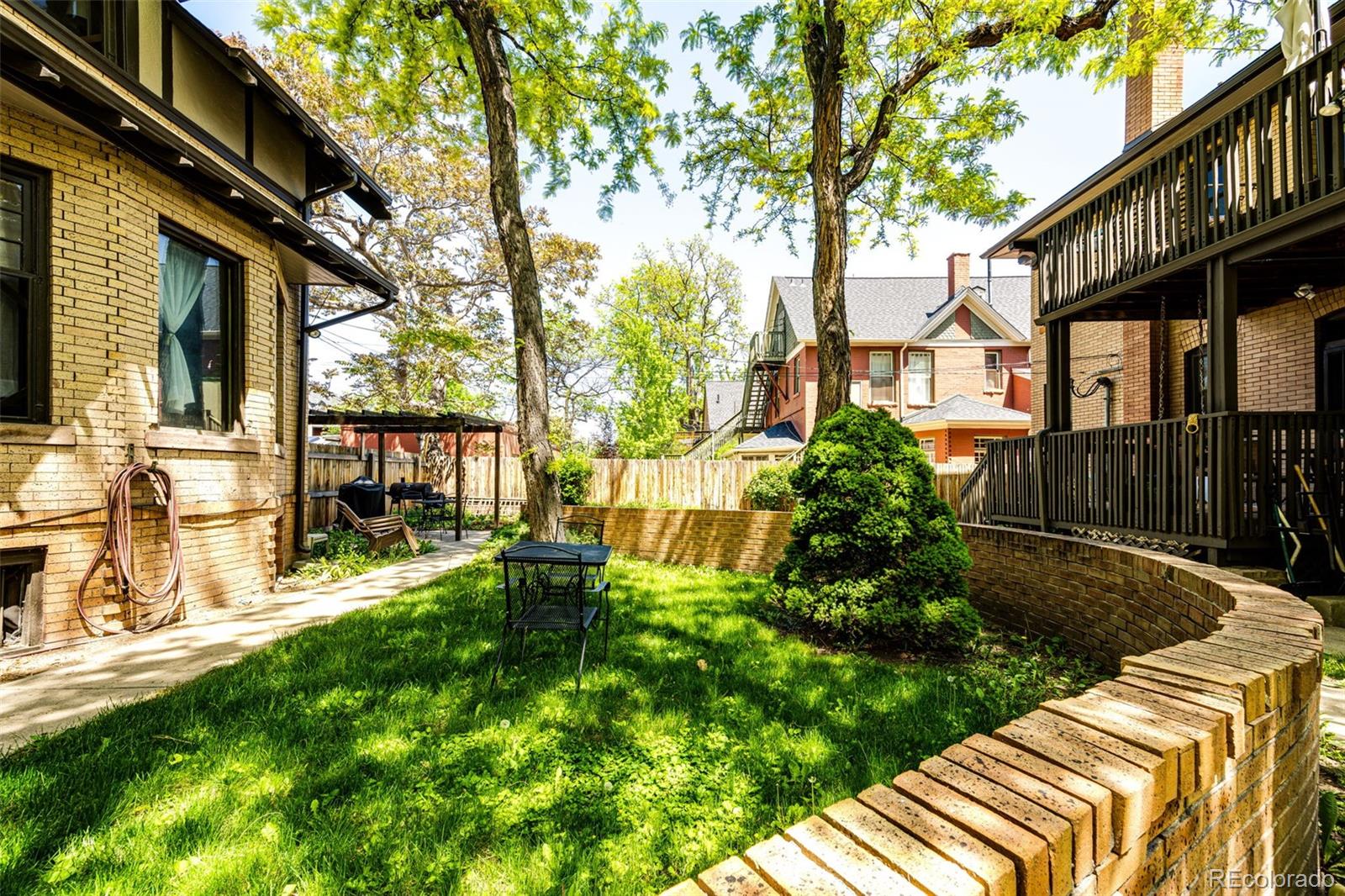 1401 Fillmore Street, Unit 5 Denver, CO 80206 - Photo 19 of 19 a view of backyard of house with green space