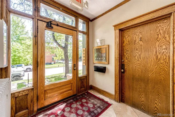a view of an entryway with a door