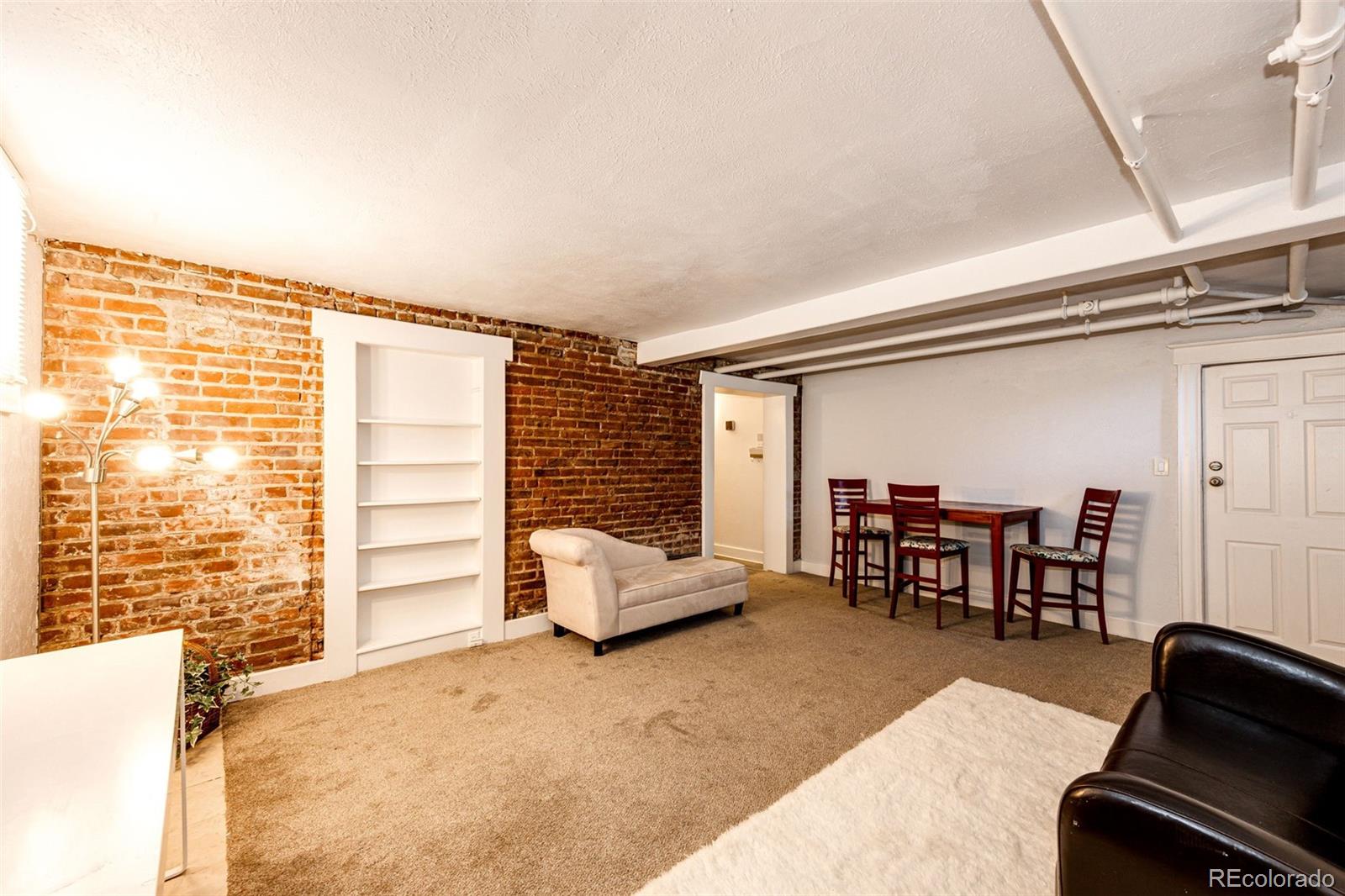 1401 Fillmore Street, Unit 5 Denver, CO 80206 - Photo 8 of 19 a living room with furniture