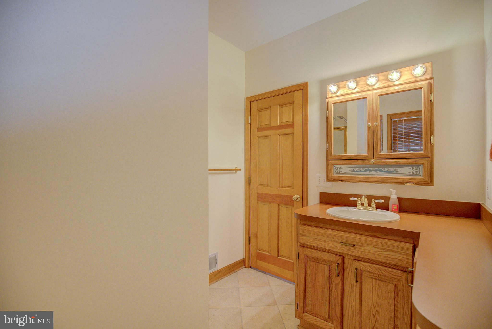 813 Blacks Hill Road Great Falls, VA 22066 - Photo 41 of 92 Mud room Full Bath - Great for coming in from pool