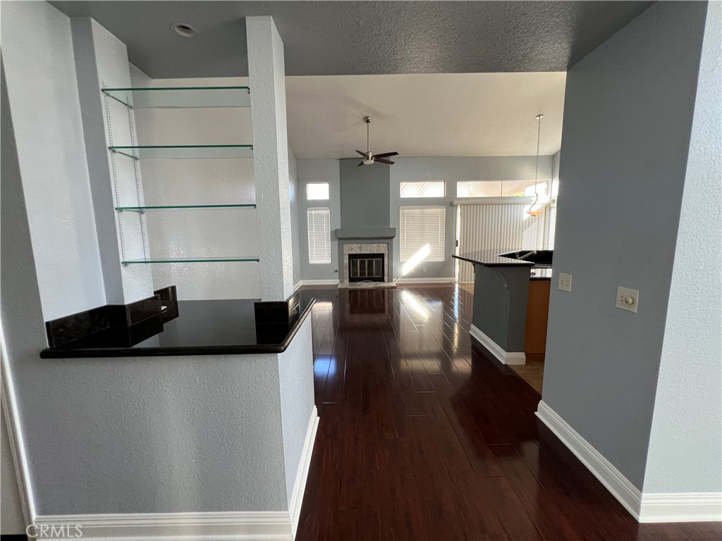 7461 Red Clover Way Highland, CA 92346 - Photo 12 of 35 a living room with furniture and a fireplace