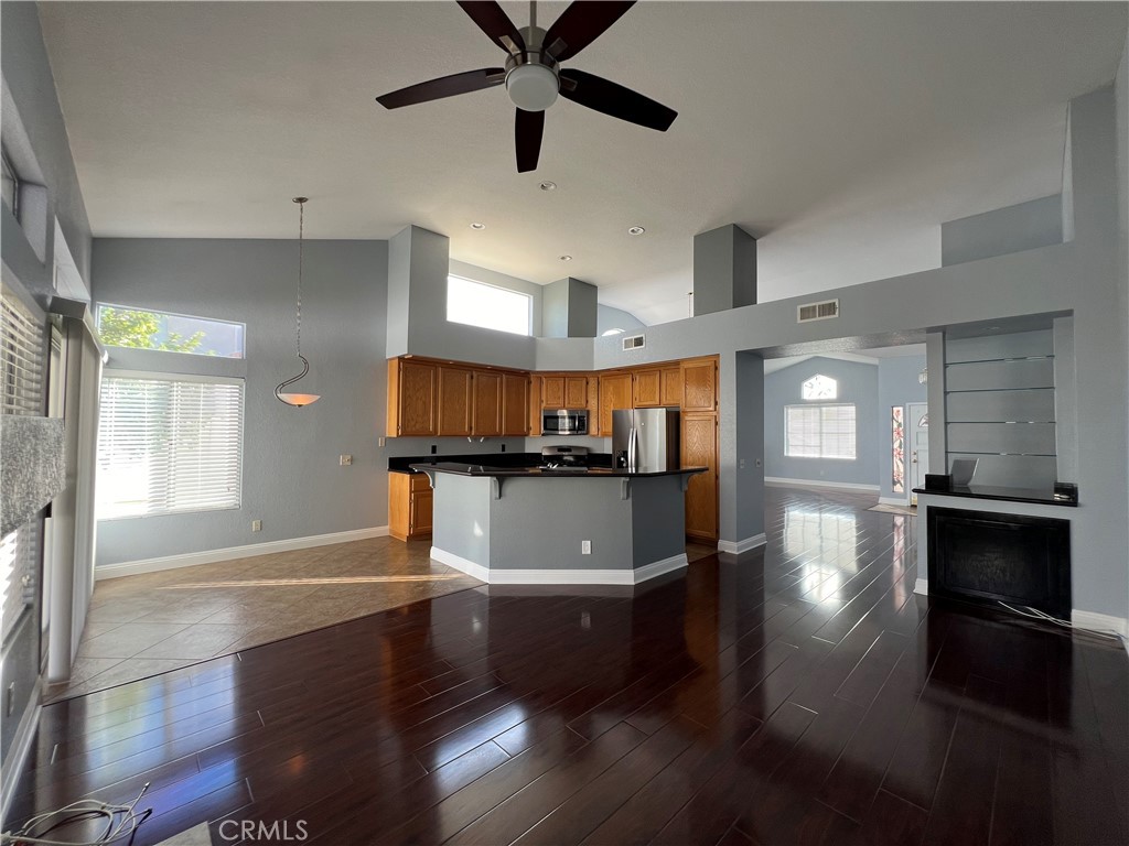 7461 Red Clover Way Highland, CA 92346 - Photo 15 of 35 a view of a kitchen with a sink and a stove top oven