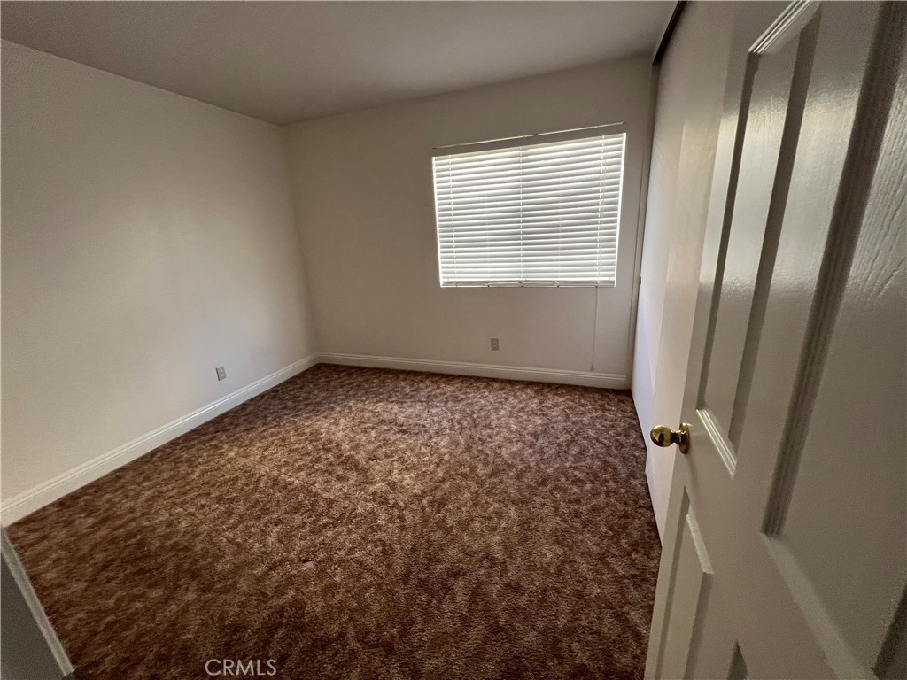 7461 Red Clover Way Highland, CA 92346 - Photo 21 of 35 an empty room with windows