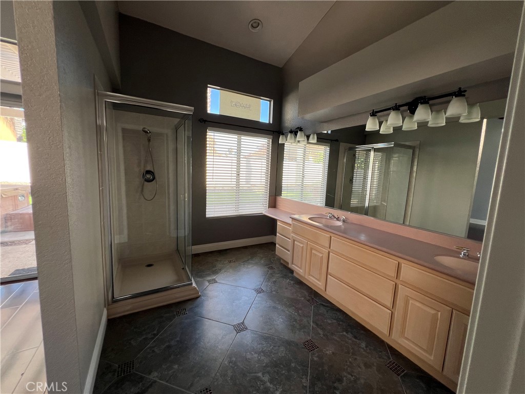 7461 Red Clover Way Highland, CA 92346 - Photo 23 of 35 a room with mirror and window