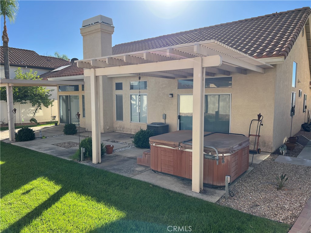 7461 Red Clover Way Highland, CA 92346 - Photo 31 of 35 a view of a house with backyard and porch