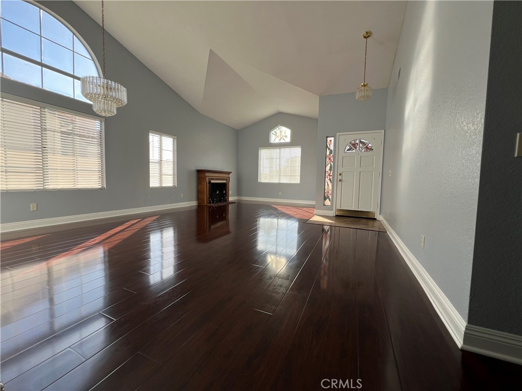7461 Red Clover Way Highland, CA 92346 - Photo 8 of 35 a view of gallery with wooden floor