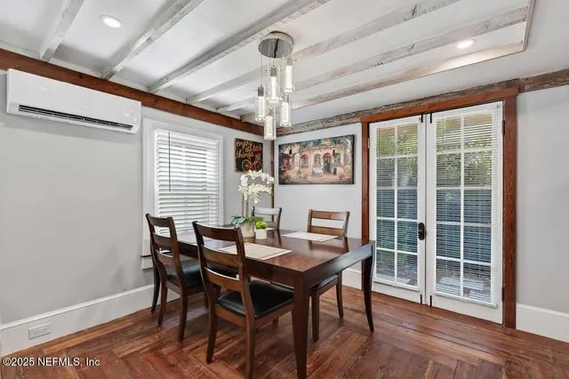 a view of a backyard with sitting area