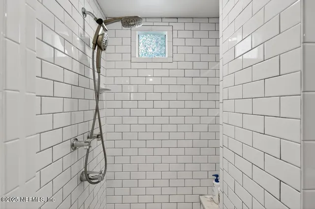 a kitchen with a stove and a microwave