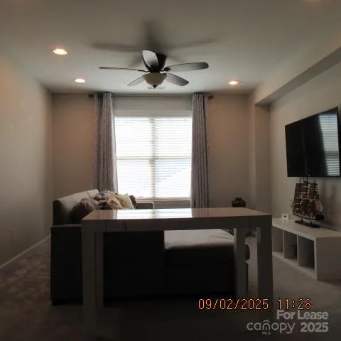 a kitchen with a sink a counter top space and a window