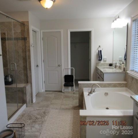 7314 Vesper Drive Huntersville, NC 28078 - Photo 23 of 24 a view of a bathroom with a tub and mirror