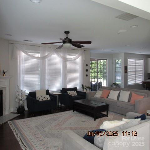 7314 Vesper Drive Huntersville, NC 28078 - Photo 9 of 24 a living room with furniture and a large window