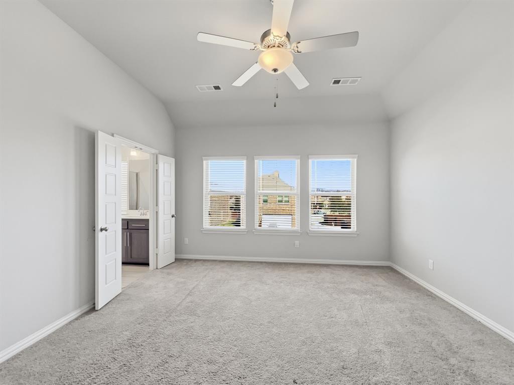 12632 Akenside Road Frisco, TX 75035 - Photo 17 of 40 wooden floor in an empty room with a window