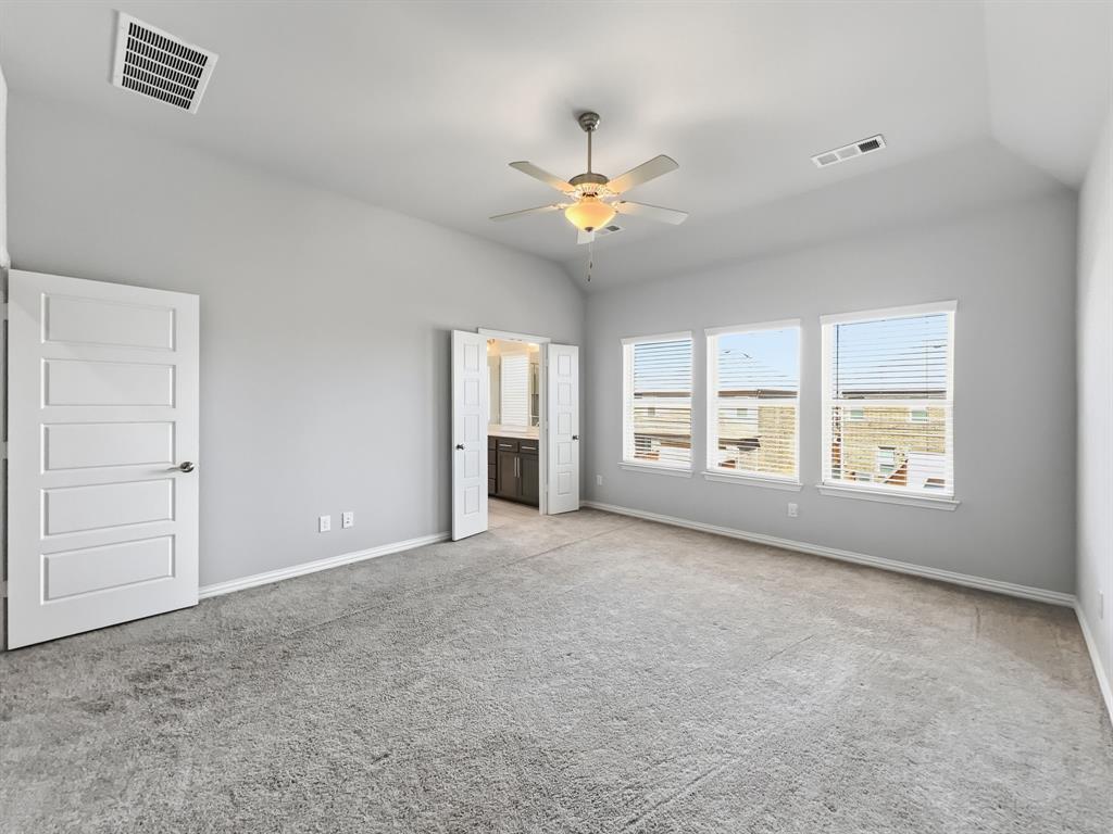 12632 Akenside Road Frisco, TX 75035 - Photo 18 of 40 a view of an empty room with a window