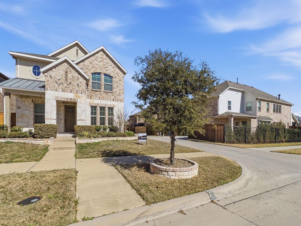 12632 Akenside Road Frisco, TX 75035 - Photo 2 of 40 a front view of a house with garden