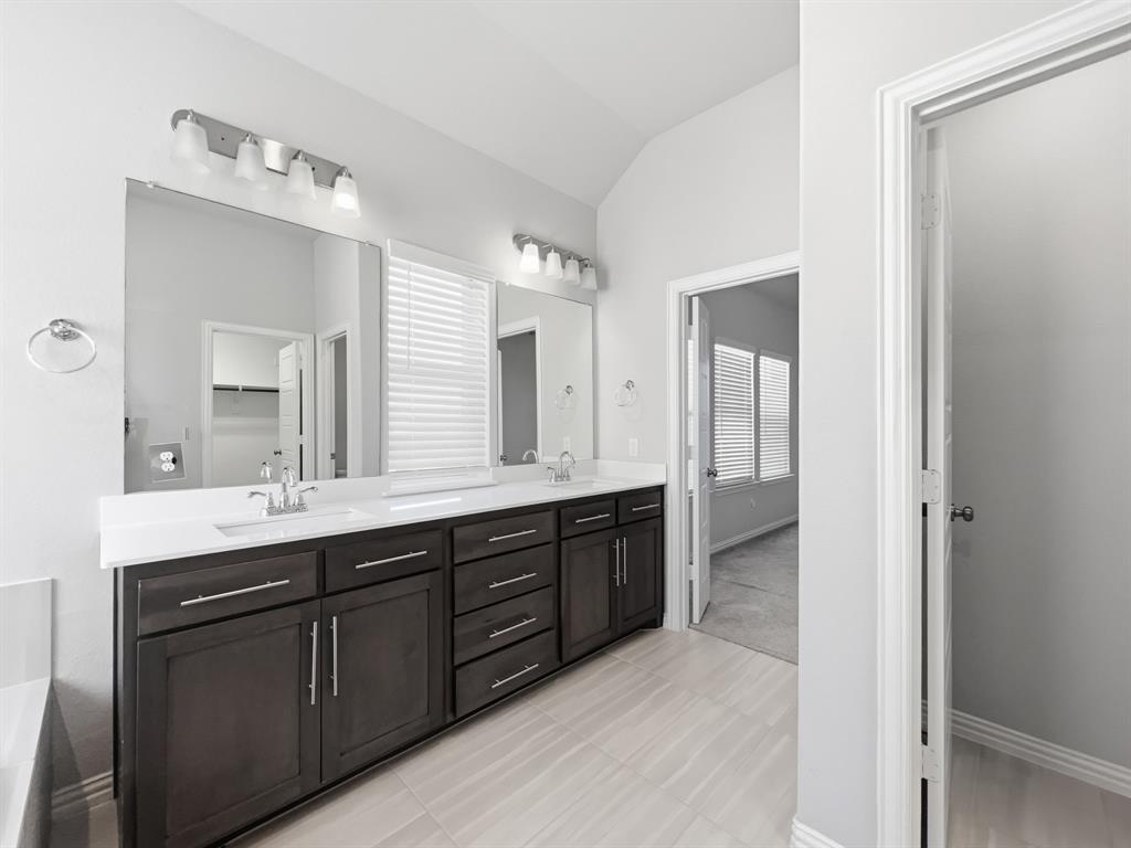 12632 Akenside Road Frisco, TX 75035 - Photo 21 of 40 a spacious bathroom with a double vanity sink mirror and double