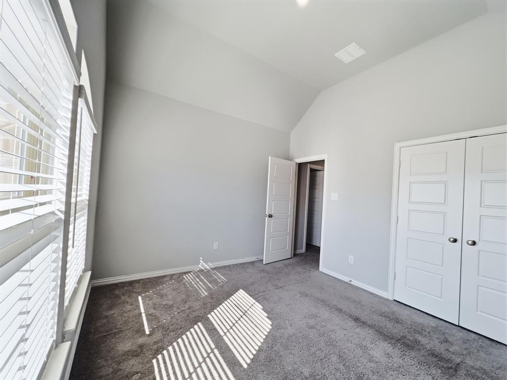 12632 Akenside Road Frisco, TX 75035 - Photo 29 of 40 a view of an empty room and window