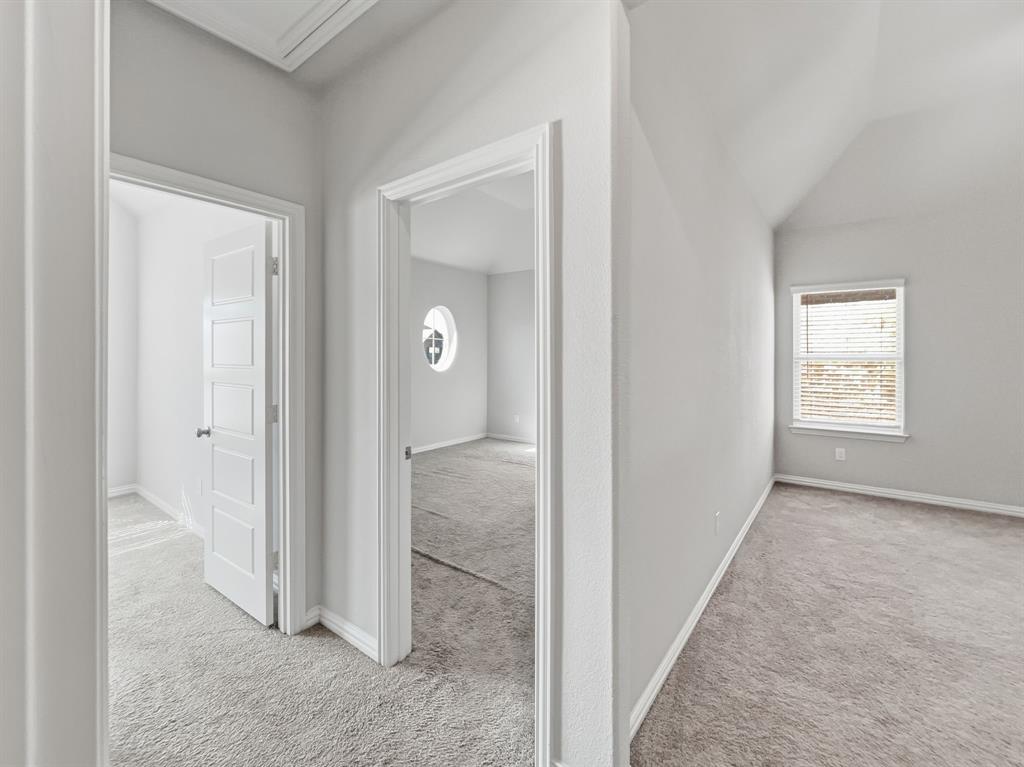 12632 Akenside Road Frisco, TX 75035 - Photo 35 of 40 Upper-level layout includes access to Bedroom #2 and Bedroom #3, along with an open area at the top of the staircase. The additional space may be used as a secondary living area, office, or flex space.