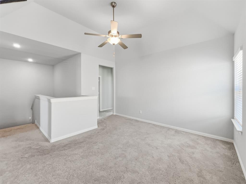 12632 Akenside Road Frisco, TX 75035 - Photo 38 of 40 Upper-level layout includes access to Bedroom #2 and Bedroom #3, along with an open area at the top of the staircase. The additional space may be used as a secondary living area, office, or flex space.