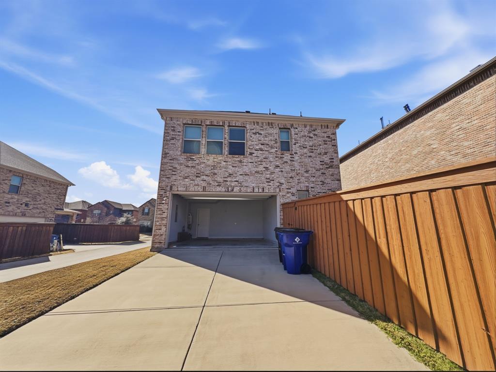 12632 Akenside Road Frisco, TX 75035 - Photo 40 of 40 a balcony view with a fireplace