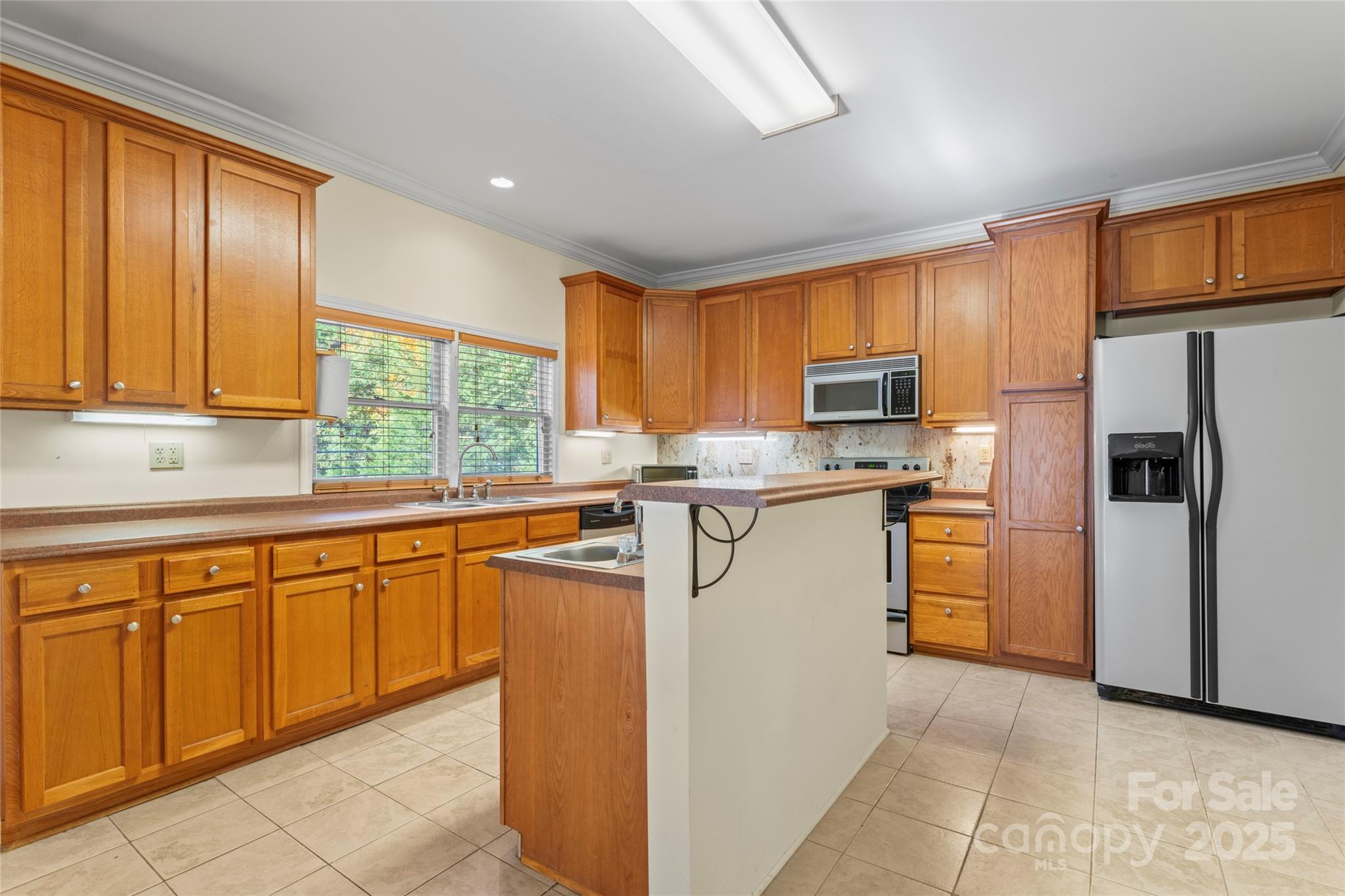 645 Chestnut Ridge Church Road Kings Mountain, NC 28086 - Photo 17 of 45 a kitchen with granite countertop cabinets stainless steel appliances a sink and a window