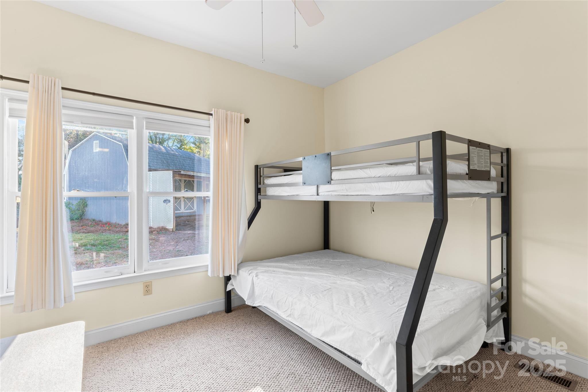 645 Chestnut Ridge Church Road Kings Mountain, NC 28086 - Photo 24 of 45 a bedroom with a bed and a window