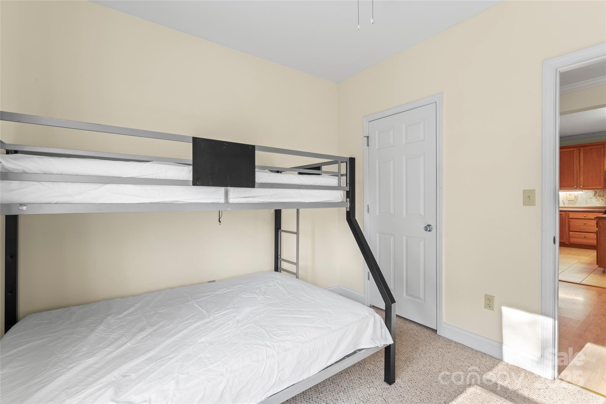 645 Chestnut Ridge Church Road Kings Mountain, NC 28086 - Photo 25 of 45 a bedroom with a bed and a table