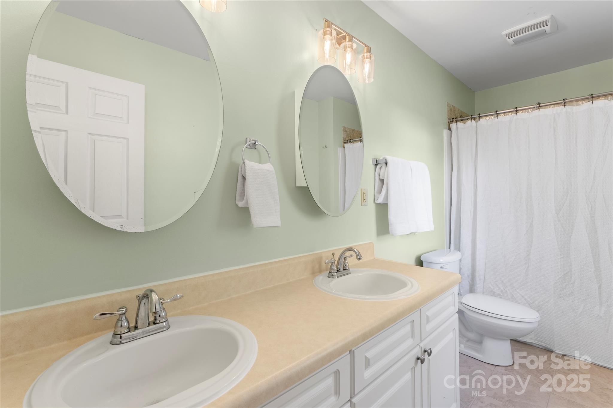 645 Chestnut Ridge Church Road Kings Mountain, NC 28086 - Photo 30 of 45 a bathroom with a sink and a mirror