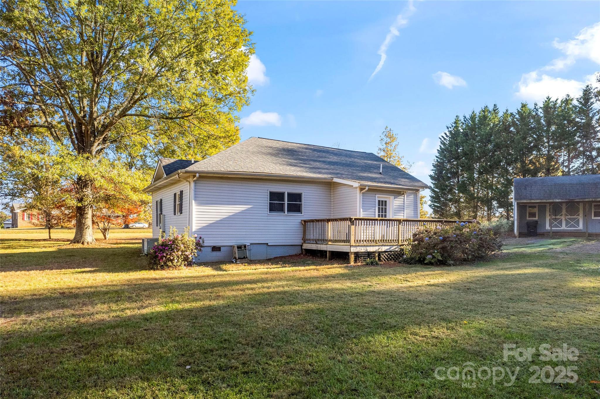 645 Chestnut Ridge Church Road Kings Mountain, NC 28086 - Photo 34 of 45 a view of a house with a big yard and large trees