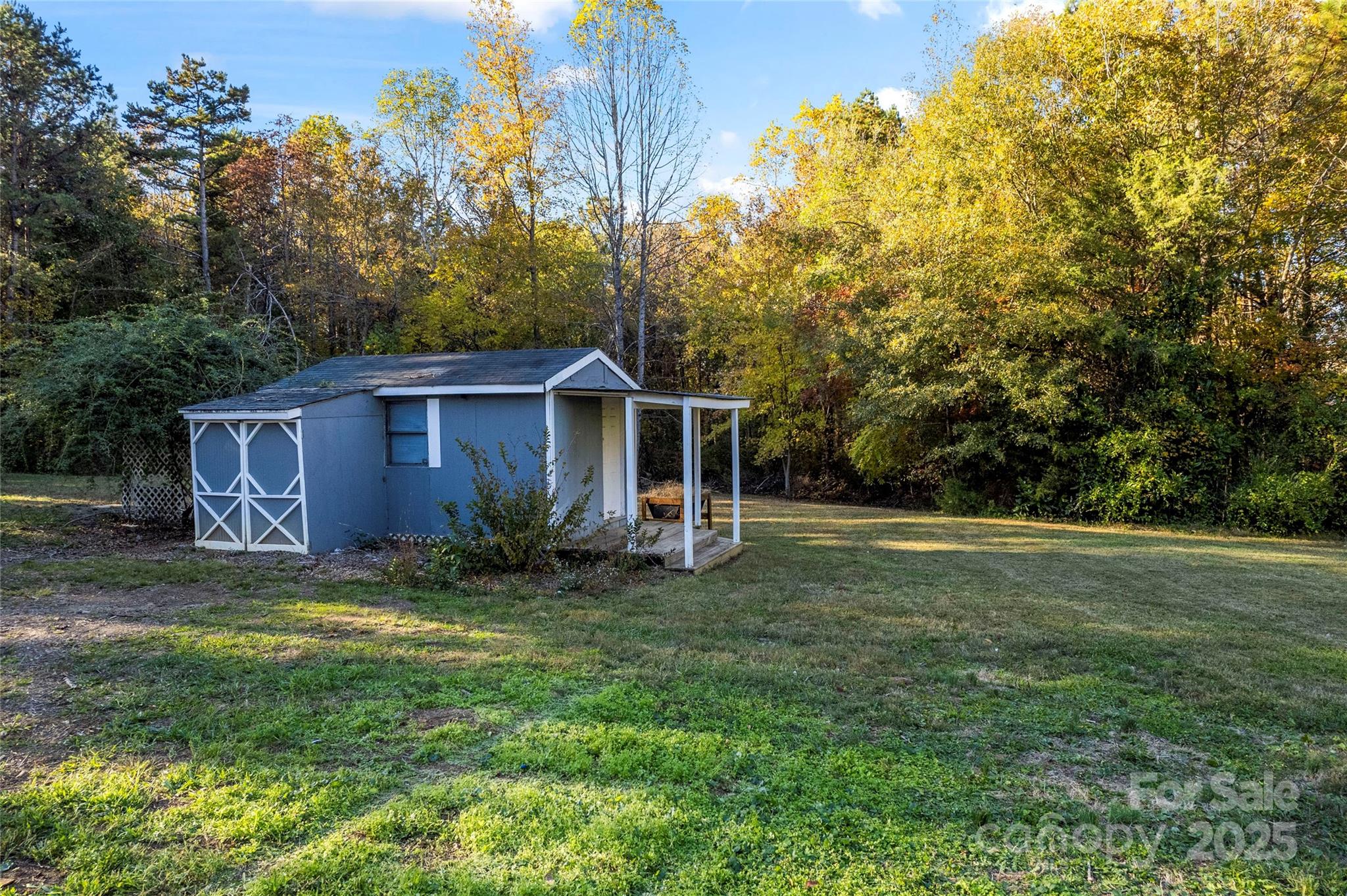 645 Chestnut Ridge Church Road Kings Mountain, NC 28086 - Photo 41 of 45 a view of a house with a yard