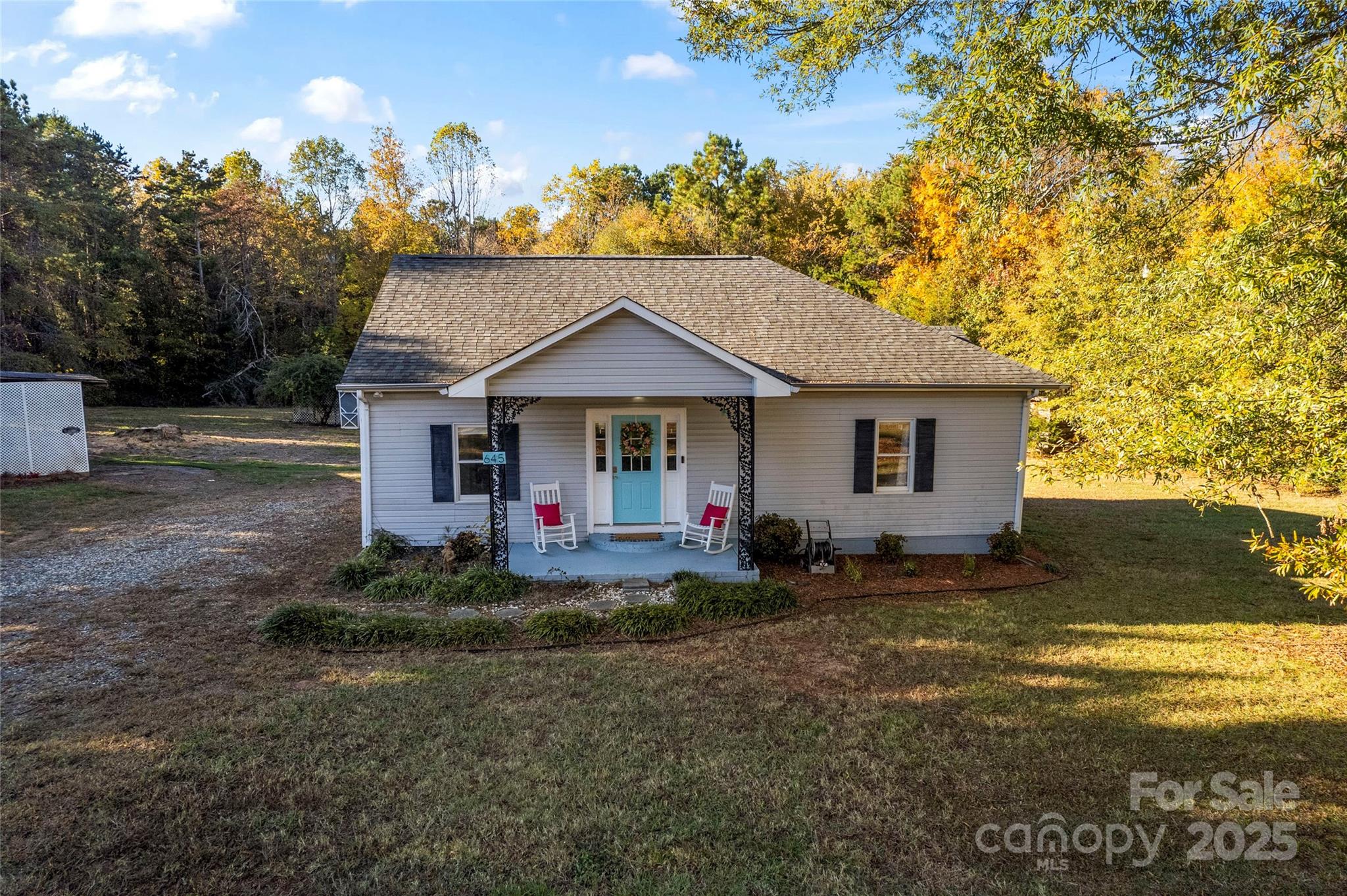 645 Chestnut Ridge Church Road Kings Mountain, NC 28086 - Photo 5 of 45 a front view of a house with a garden