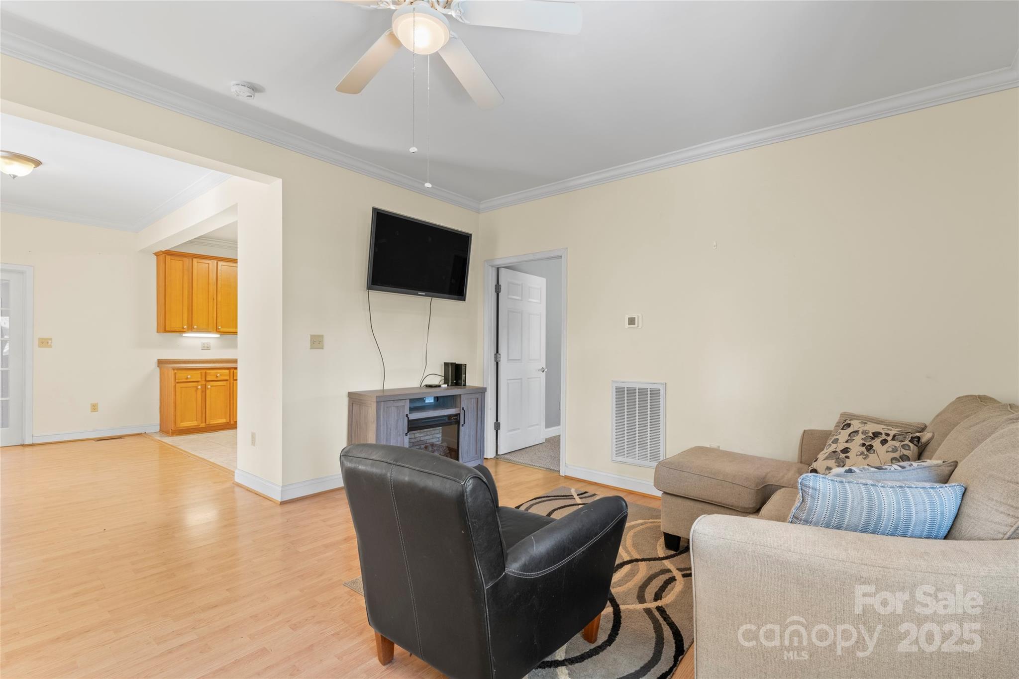 645 Chestnut Ridge Church Road Kings Mountain, NC 28086 - Photo 10 of 45 a living room with furniture and a flat screen tv