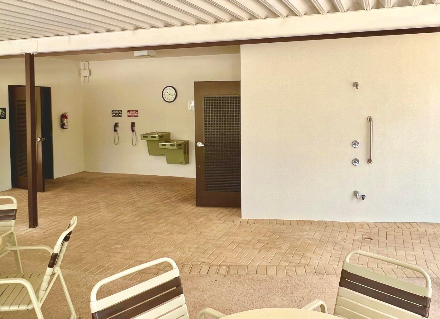 273 Mansfield H, Unit 273 Boca Raton, FL 33434 - Photo 25 of 33 Pool Rest Rooms