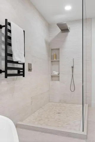 a room with a closet and wooden floor