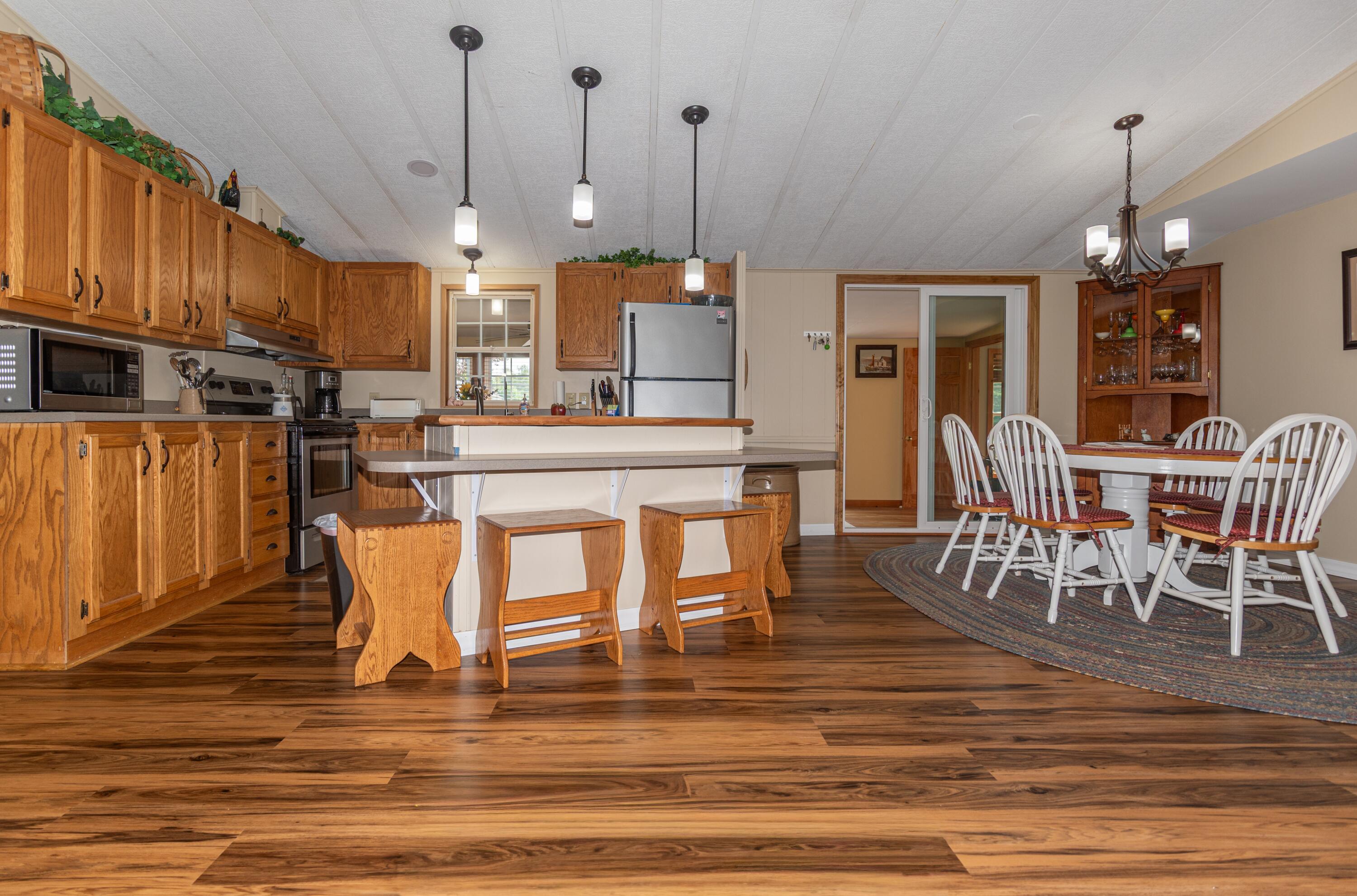 25 Green Point Road, Unit 302 Madawaska, ME 04773 - Photo 27 of 50 Kitchen and Dining Area