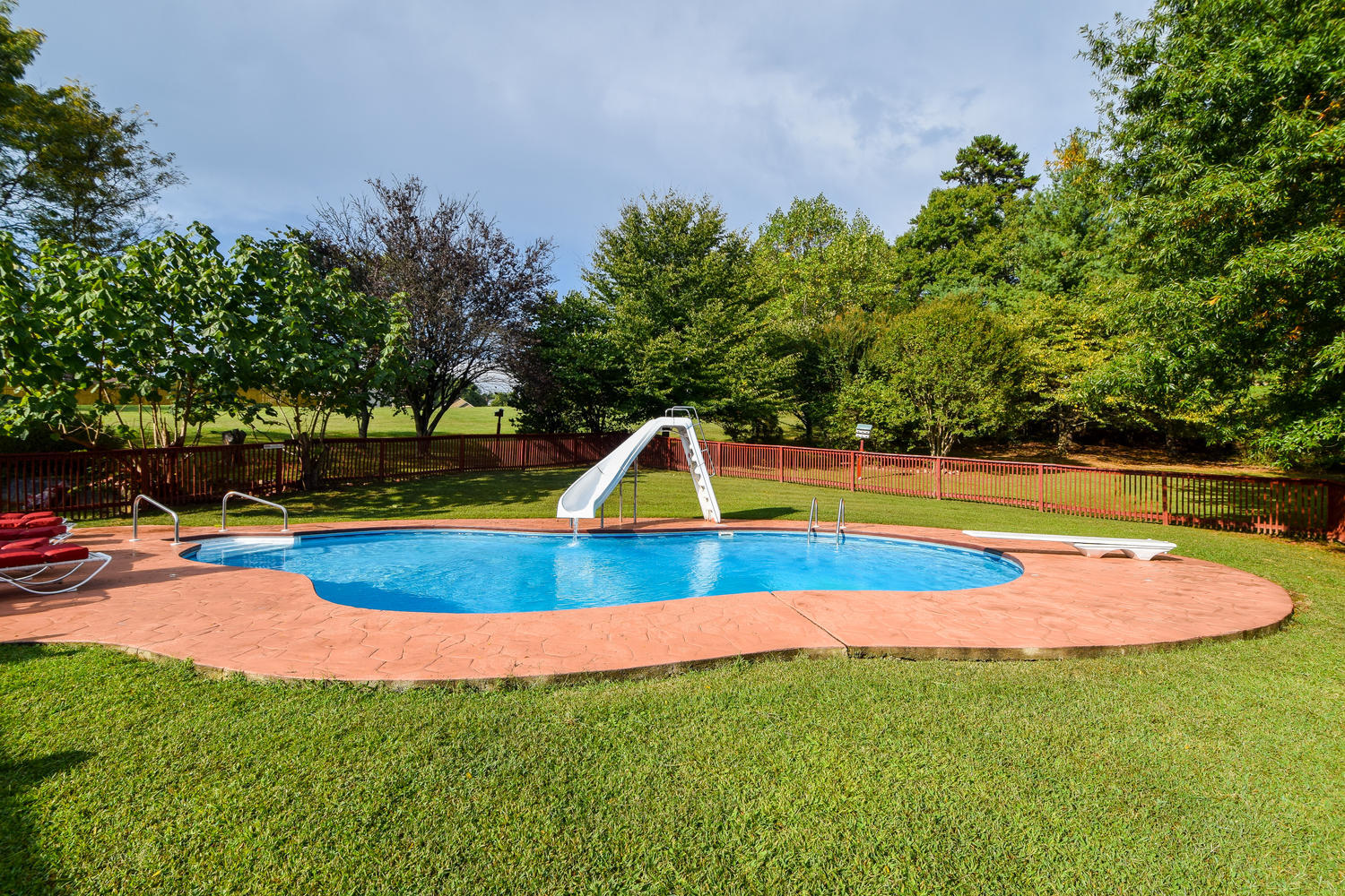 58 Foxcroft Lane Blue Ridge, VA 24064 - Photo 22 of 35 a view of a swimming pool with a yard and sitting area