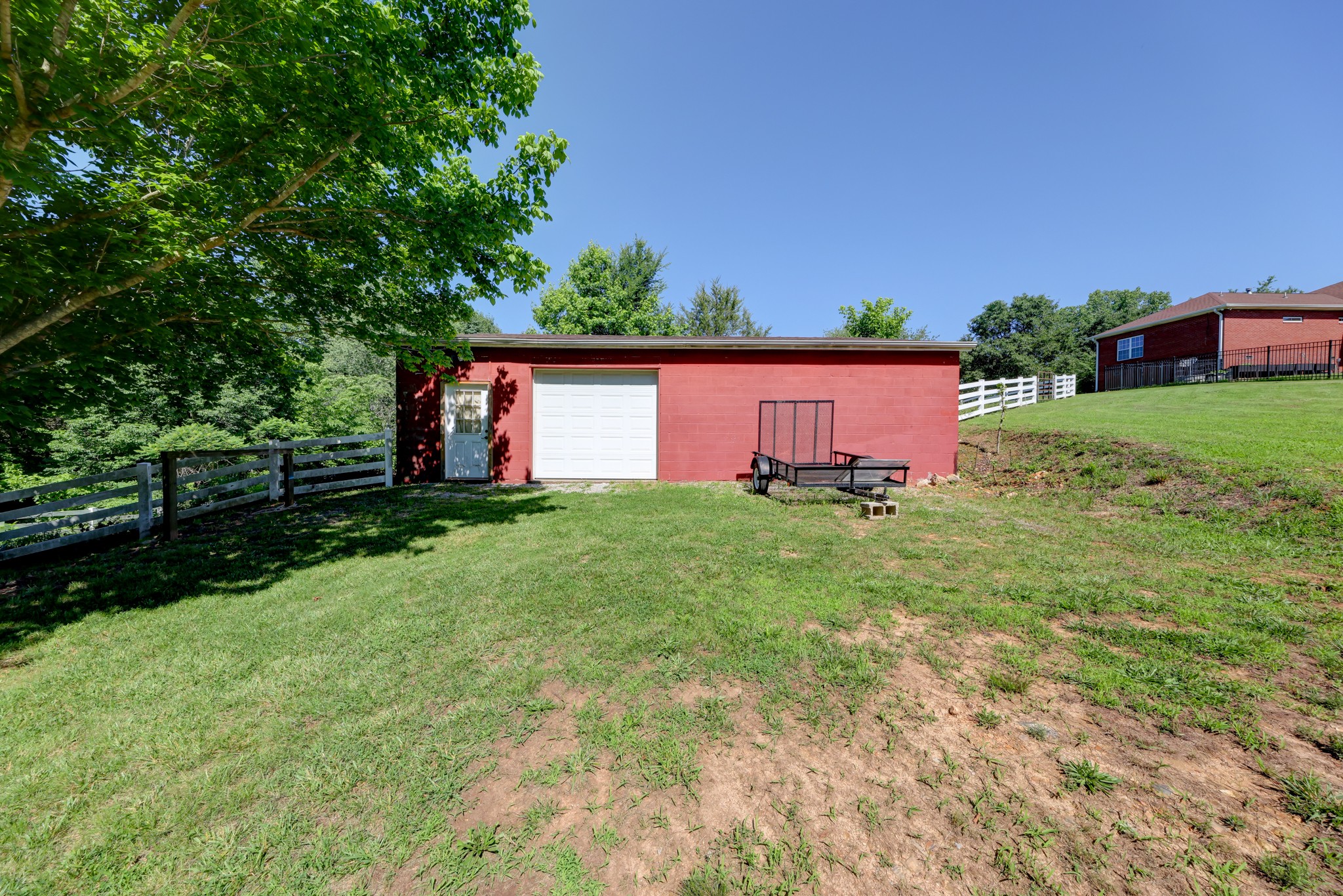 2251 Davidson Graveyard Road Clarksville, TN 37043 - Photo 10 of 78 a front view of a house with a yard and trees