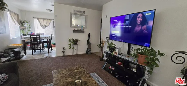 a kitchen with sink cabinets and appliances