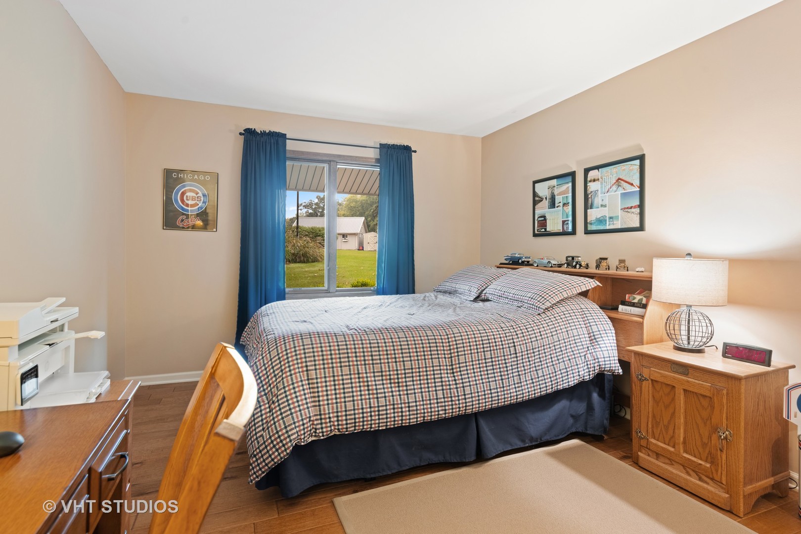 3S557 Norris Road Sugar Grove, IL 60554 - Photo 27 of 46 a bedroom with a bed and wooden floor