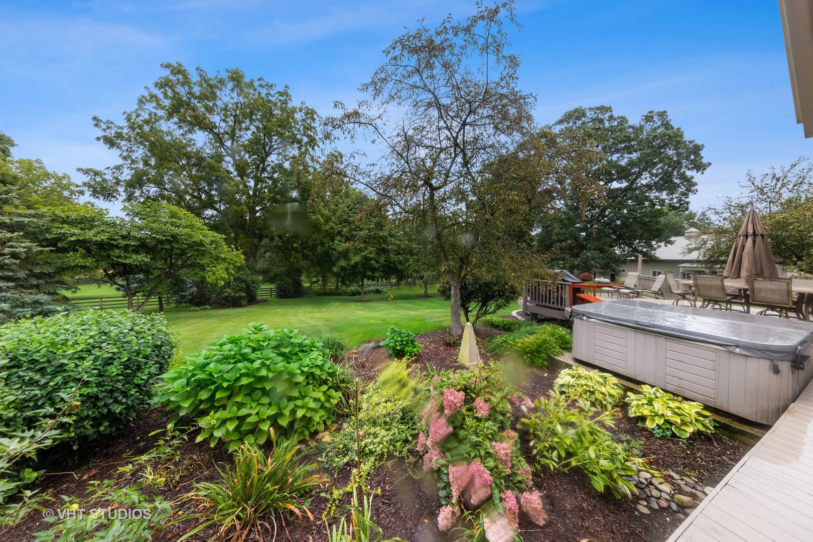 3S557 Norris Road Sugar Grove, IL 60554 - Photo 36 of 46 a view of a garden with a fountain