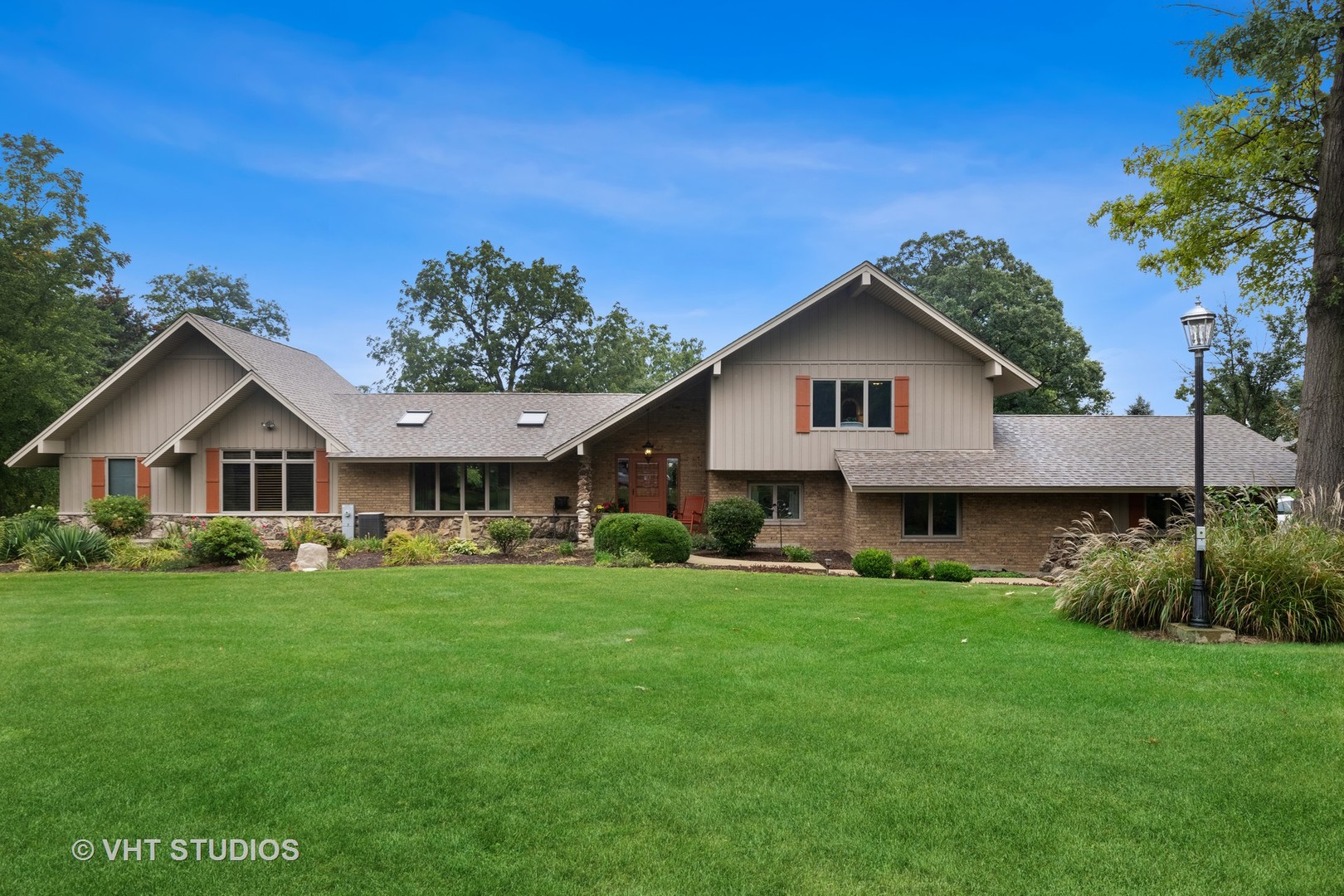 3S557 Norris Road Sugar Grove, IL 60554 - Photo 7 of 46 a view of a house with a big yard potted plants and large trees