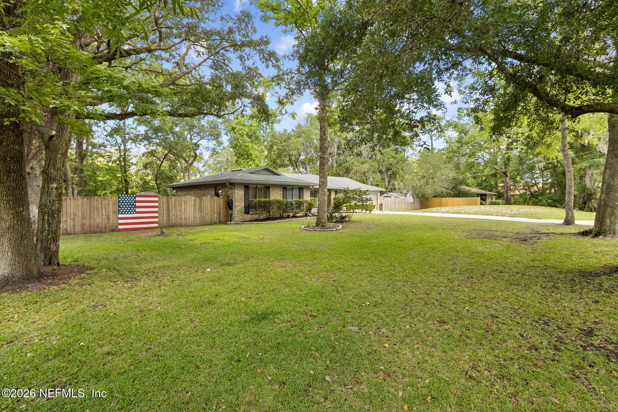 3194 Creighton Landing Road Fleming Island, FL 32003 - Photo 5 of 31 a view of a house with a yard