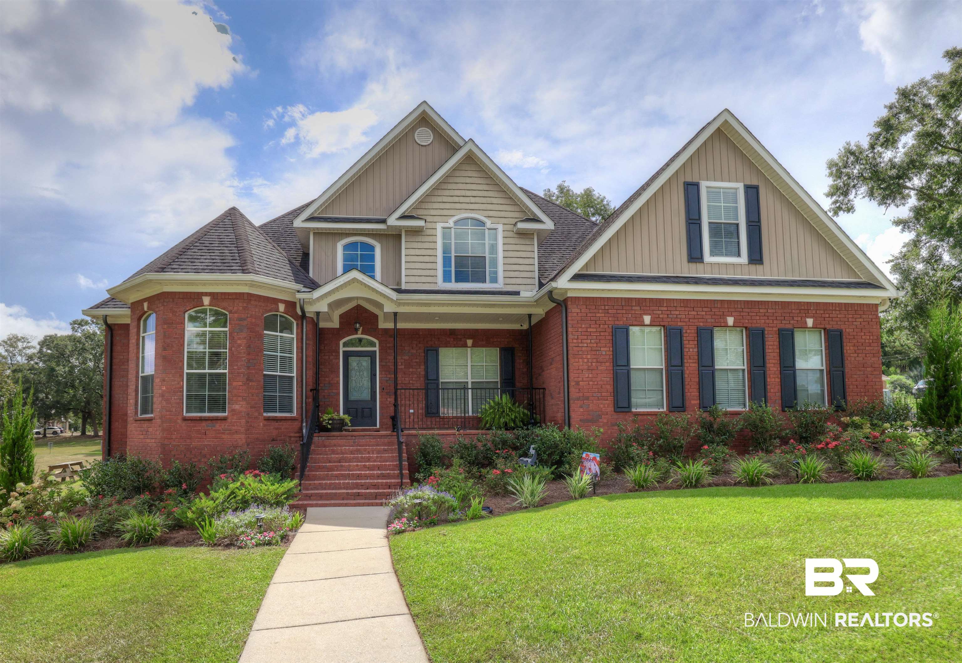 5565 Dawes Lane Theodore, AL 36582 - Photo 1 of 38 Craftsman inspired home with a front lawn