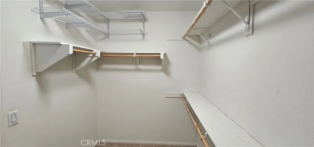 a view of a room with racks on the wall