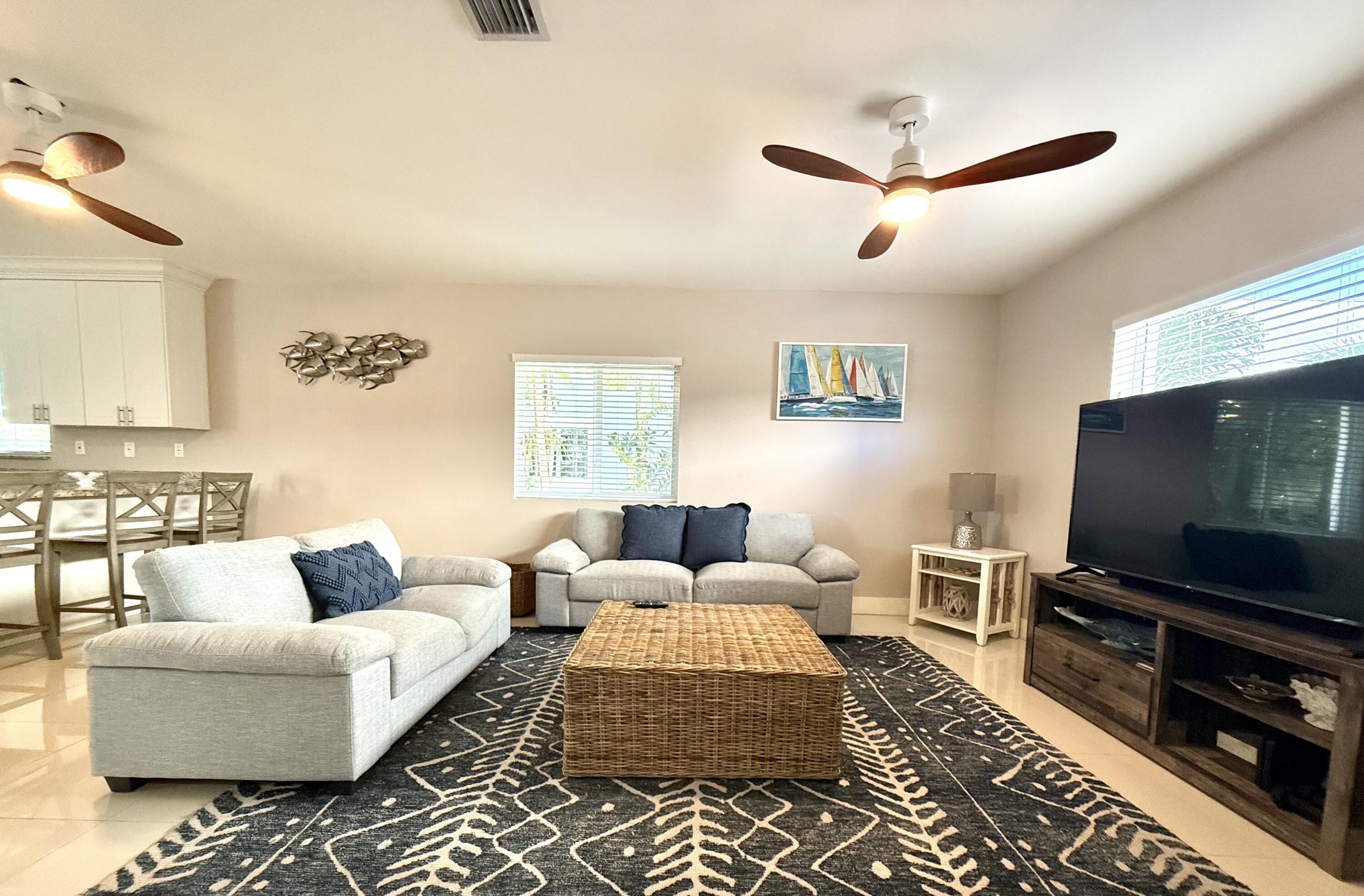 15 Lake View Drive Key Largo, FL 33037 - Photo 19 of 53 a living room with furniture and a flat screen tv