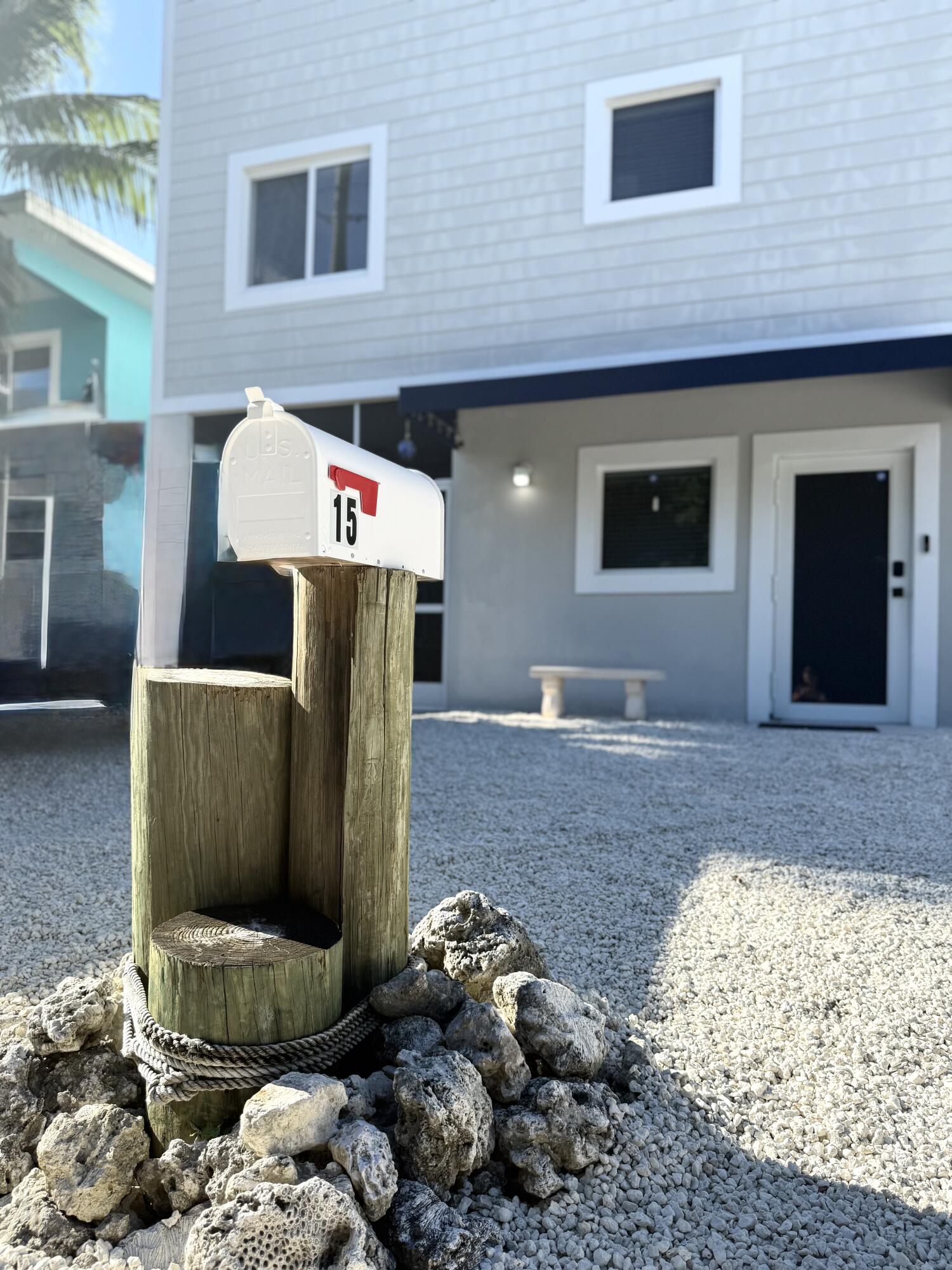 15 Lake View Drive Key Largo, FL 33037 - Photo 45 of 53 a front view of a house with a yard