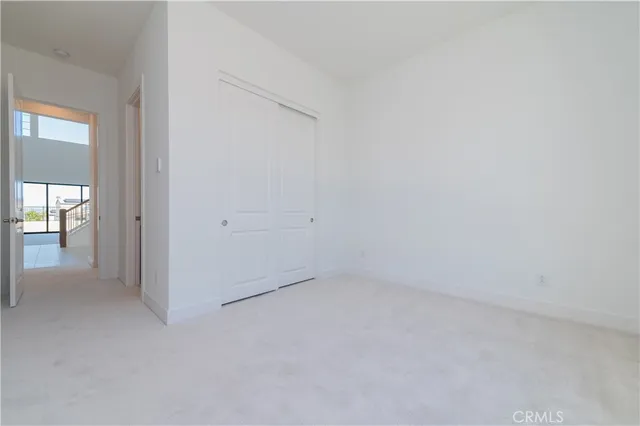wooden floor and cabinet in an empty room